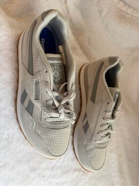 Reebok women’s Neutral Suede & Leather Sneakers in light gray and Gray